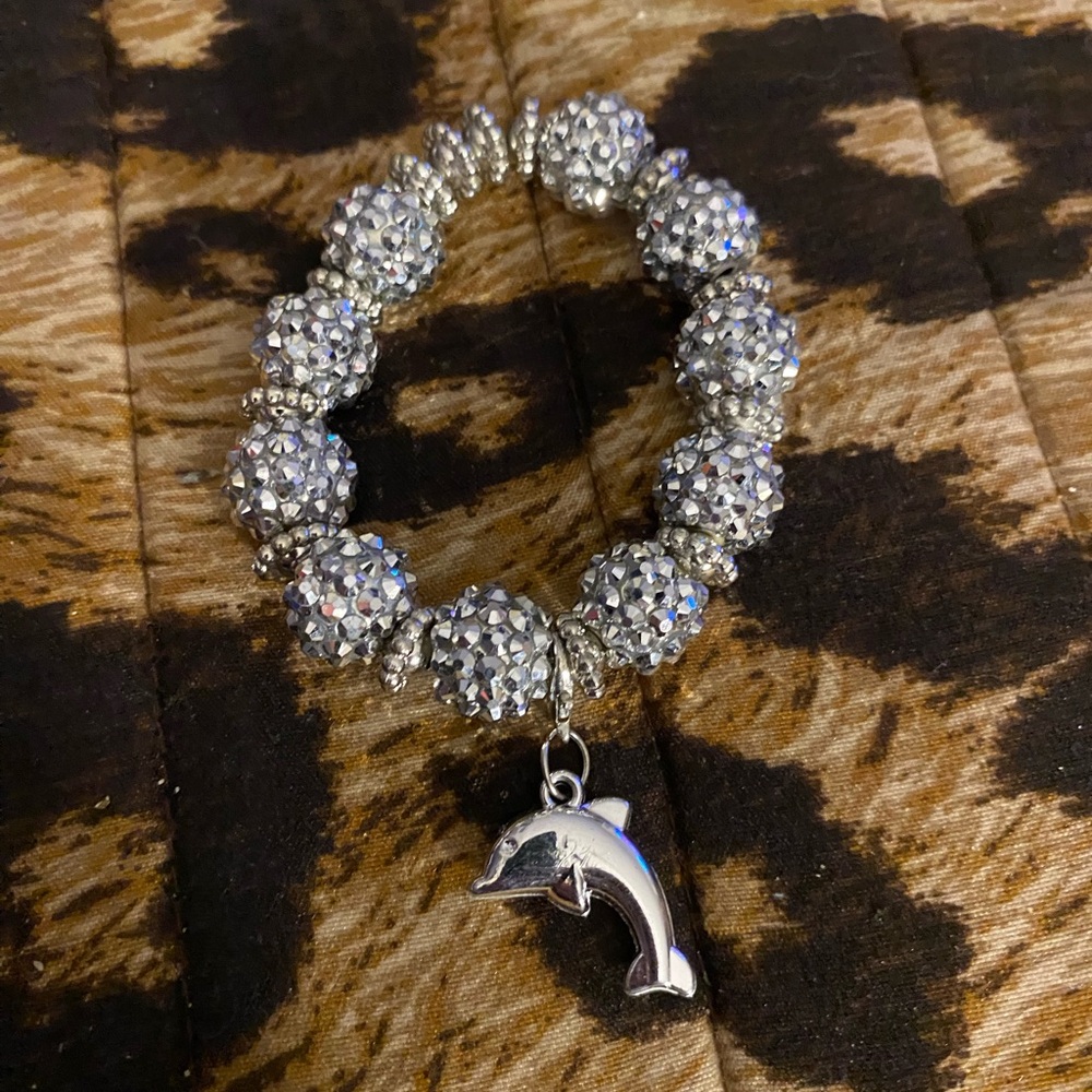 Handcrafted bracelet with a dolphin charm